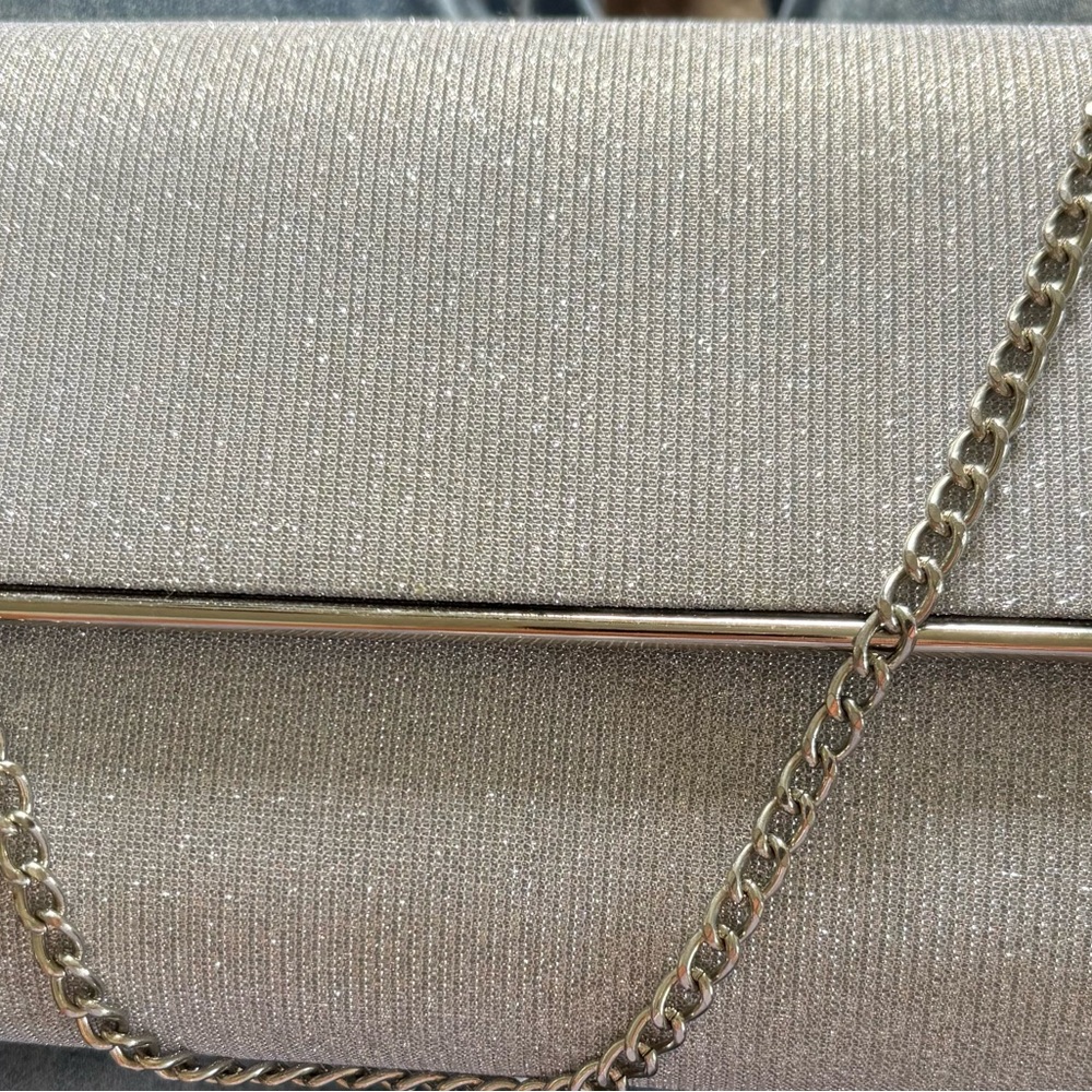 Crossbody silver glitter bag with removable chain for a clutch